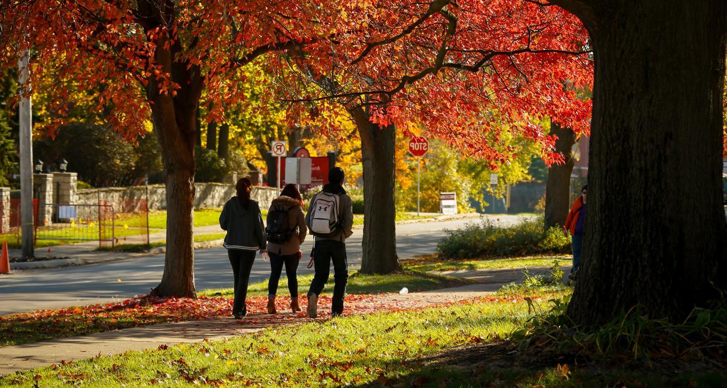 students walking on north central college campus
